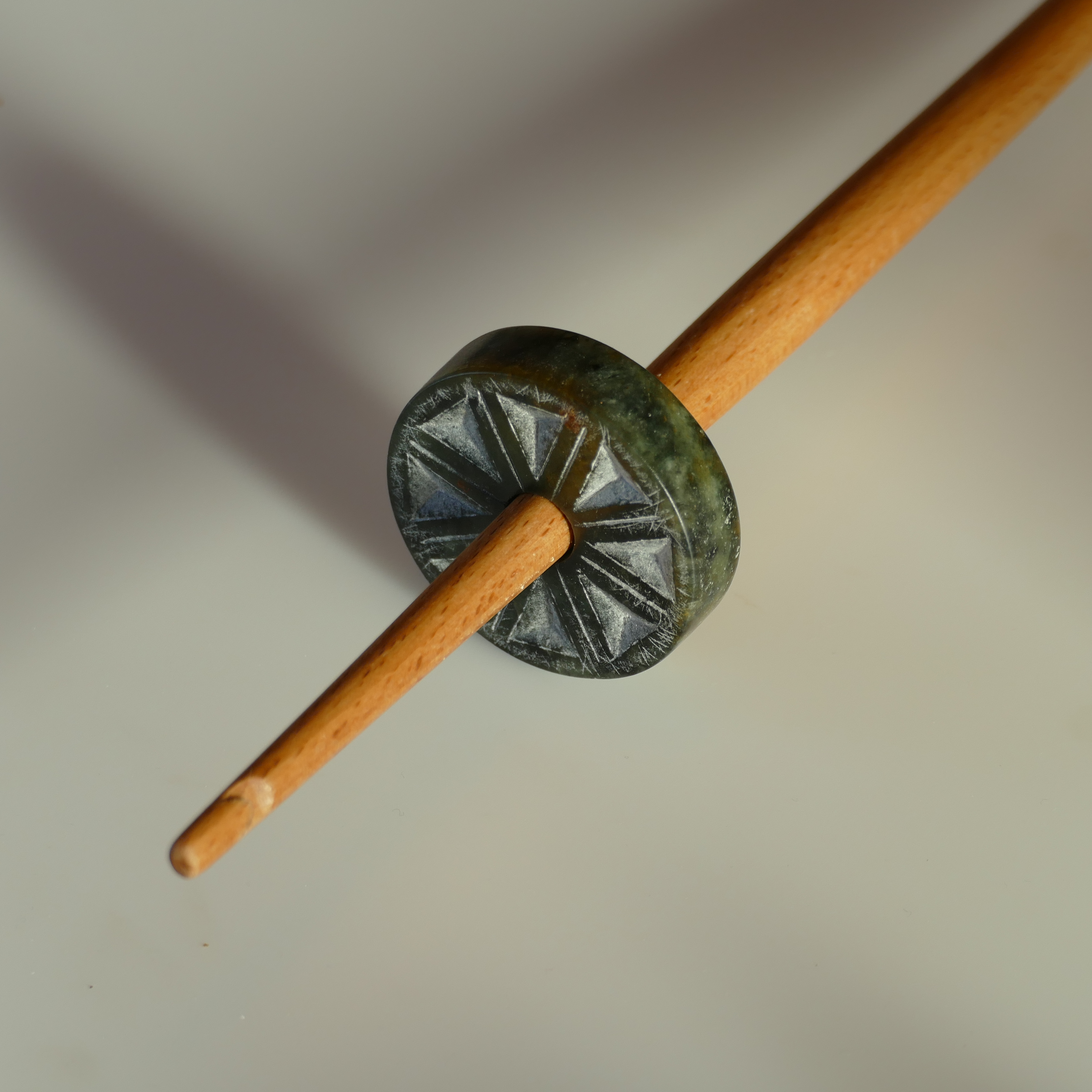 reproduction of the Viking age soapstone whorl